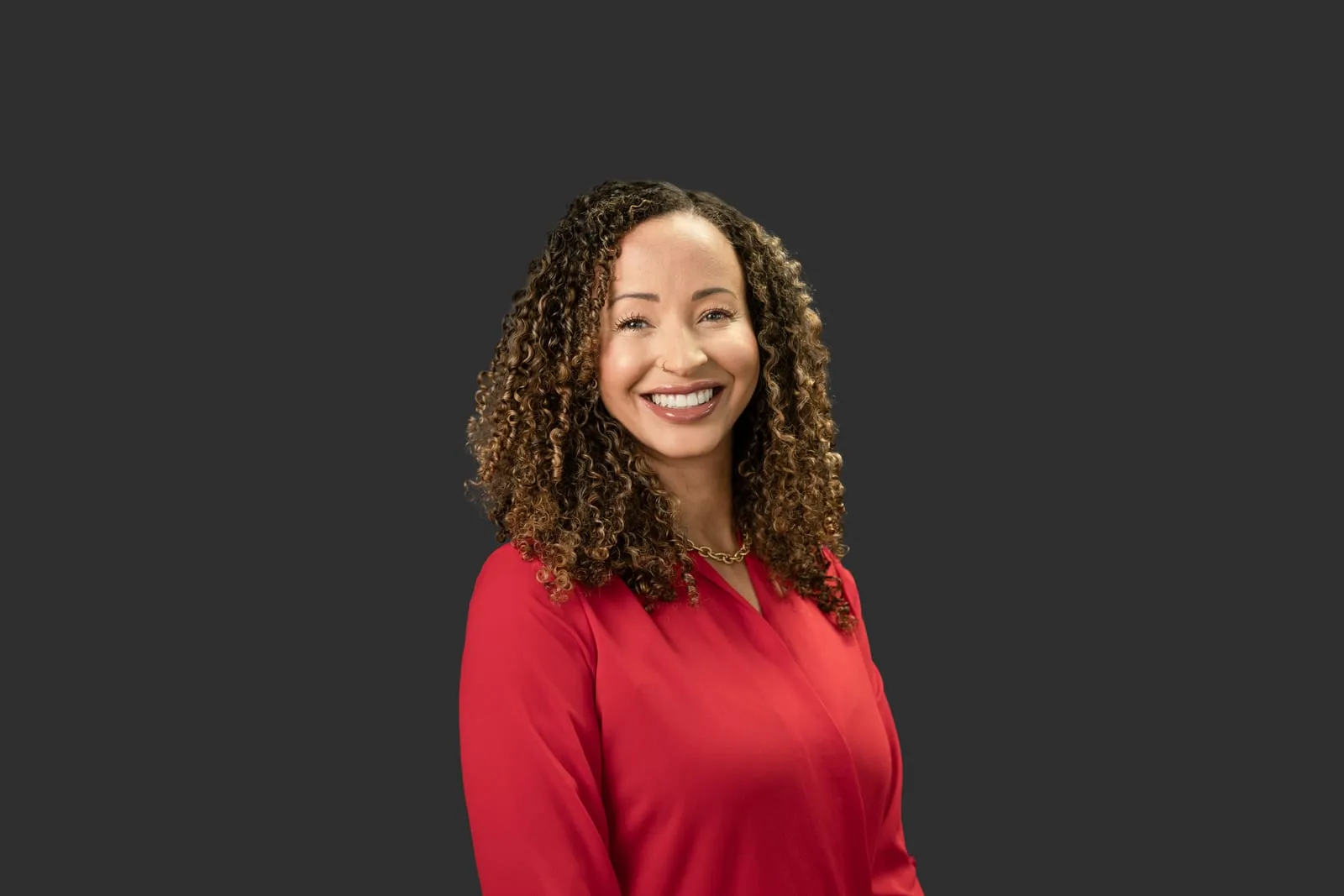 Same headshot on a solid studio background